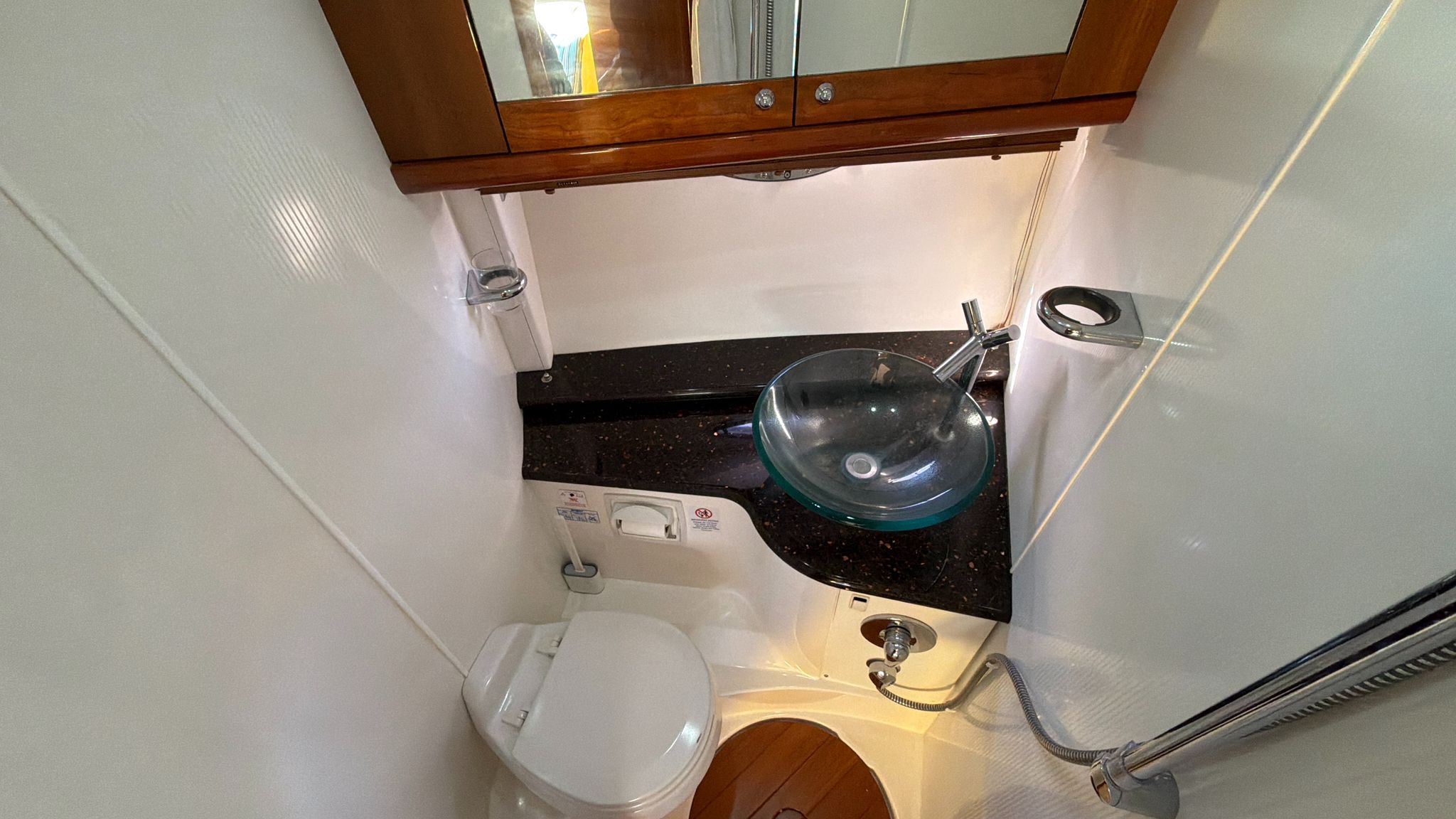 Bathroom with glass basin and shower
